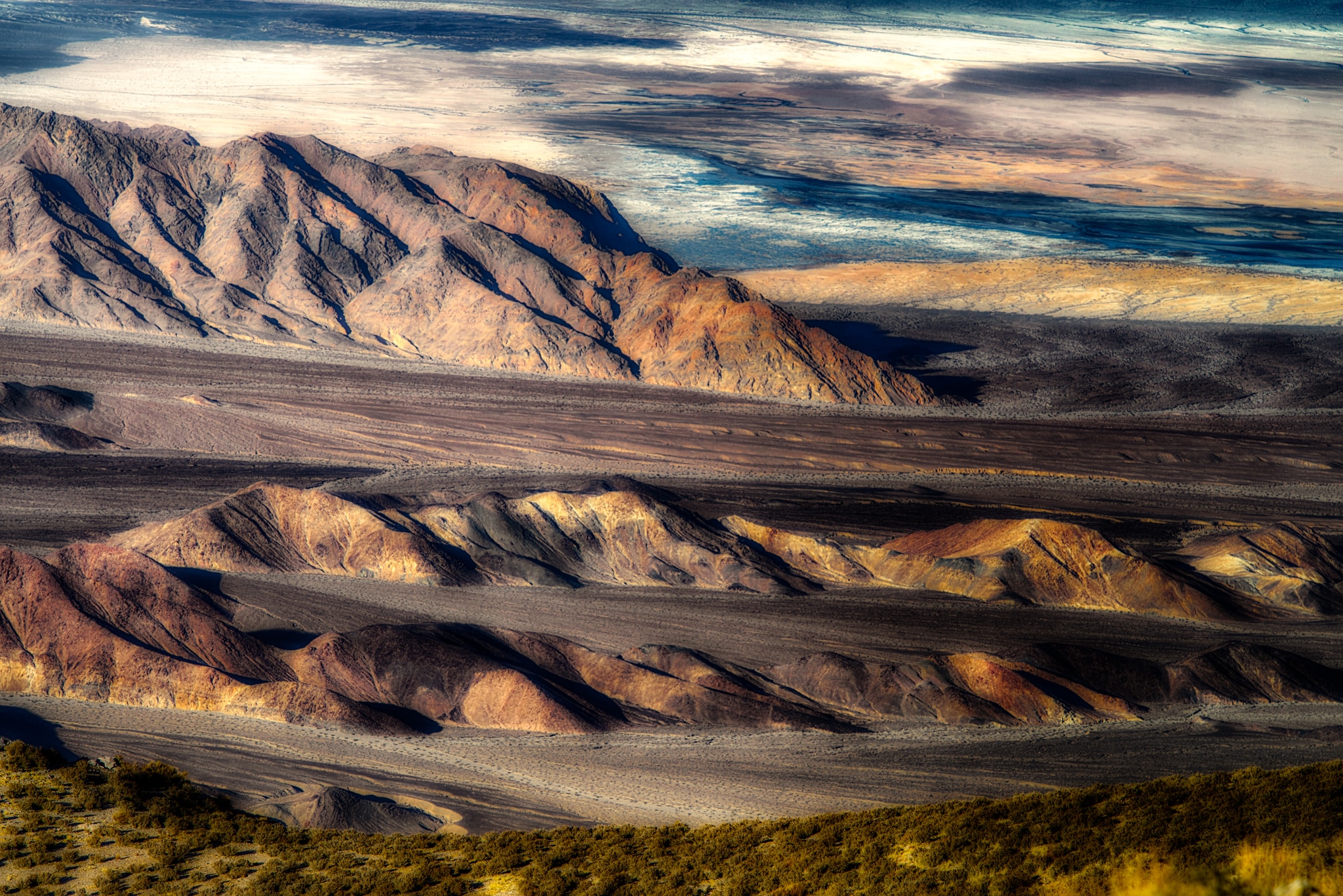 From Aguereberry Point, accessible by a dirt road off Emigrant Canyon Road in Death Valley National Park, you can see rills and valleys filled with erosional alluvium scoured out of the Panamint Range into the Death Valley Basin.