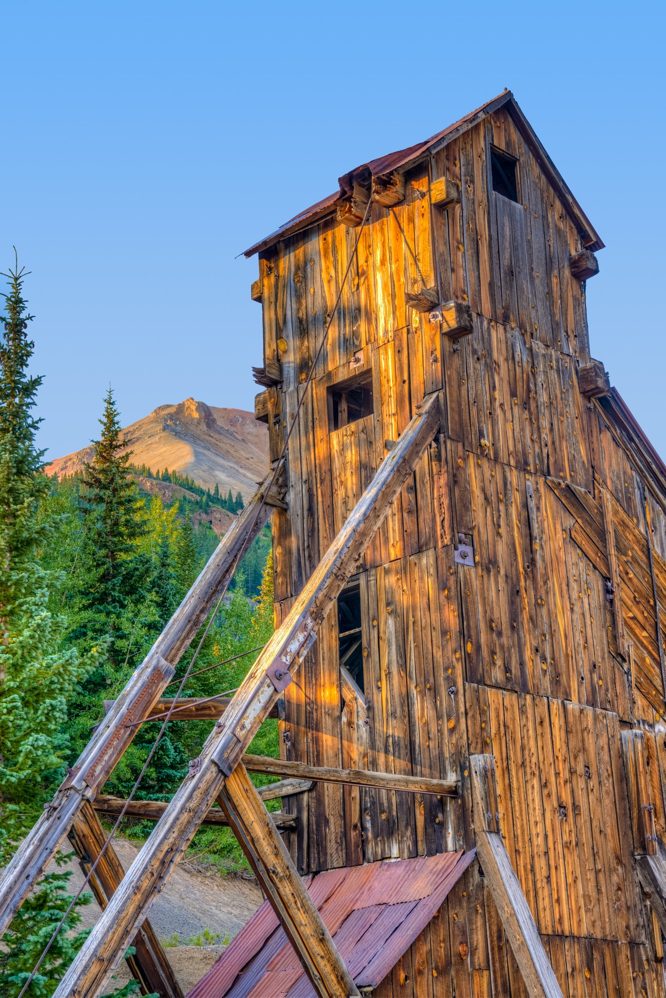 An early morning close-up view of the Yankee Girl Mine headframe viewed from Ouray County Road 31 near Ouray, Colorado.