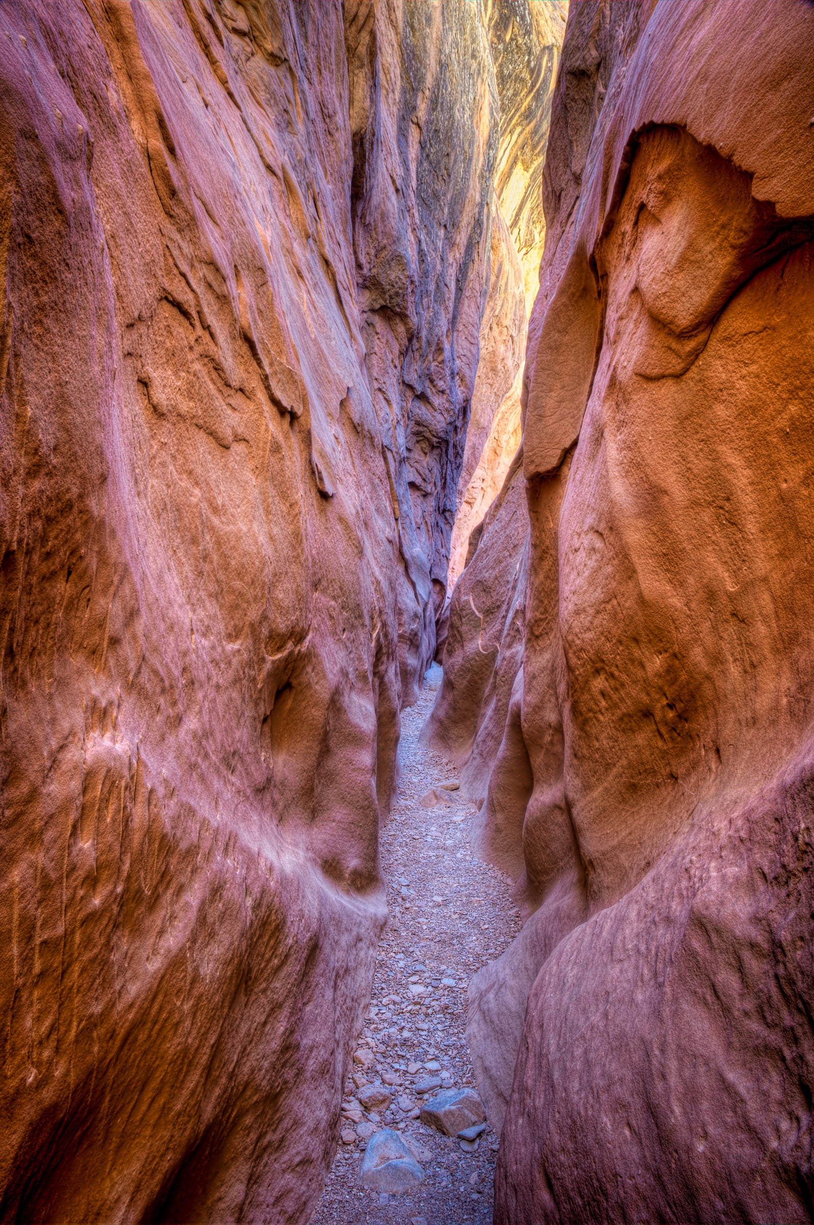 A view of the path through Bell Canyon, a slot canyon off Wild Horse Road near Goblin Valley State Park in Utah.