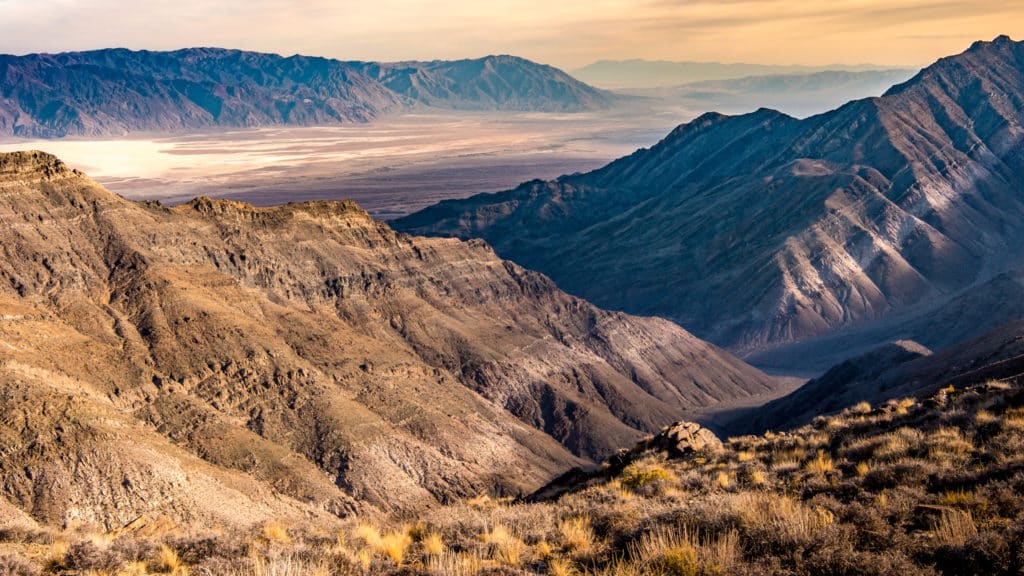 This view from Aguereberry Point, accessible by a dirt road off Emigrant Canyon Road in Death Valley National Park, out across Death Valley and Badwater Basin to the Black Mountains to the south
