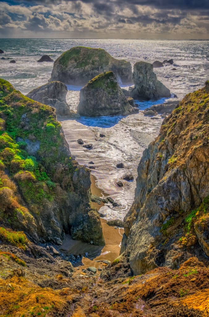 Sea Stacks and boulder add drama to the coastline along Duncan's Landing, off CA Highway 1 between Bodega Bay and Jenner, California.