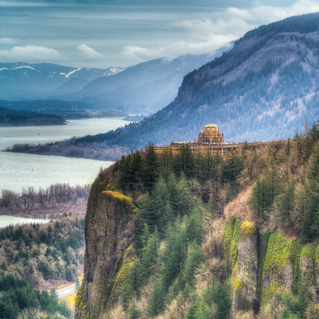 This is a view of Vista House at Crown Point taken from Chanticleer Point, also known as the Portland Women's Forum Viewpoint, along the Columbia River gorge off Historic Columbia River Highway.