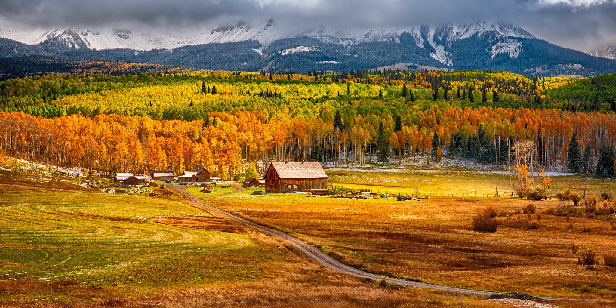 The Schmidt Ranch, a Colorado Centennial farm sourrounded by brilliant autumn aspens and snow-capped mountains, is on Wilson Mesa off Silver Pick Road near Telluride, Colorado.