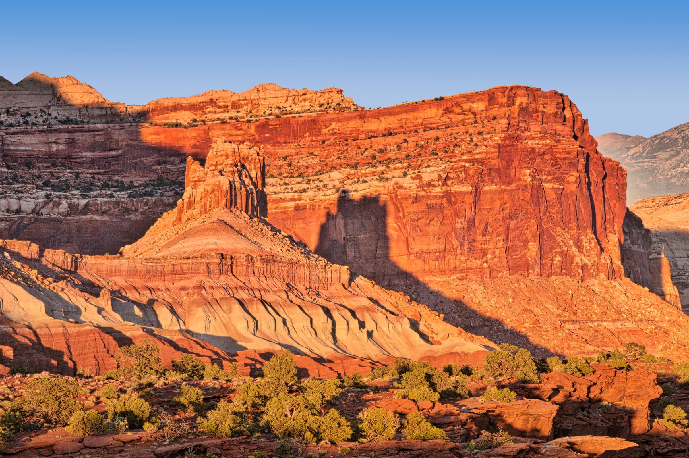 Late afternoon sun casts shadows as seen from Panorama Point along Highway 24 in Capitol Reef National Park, Utah.