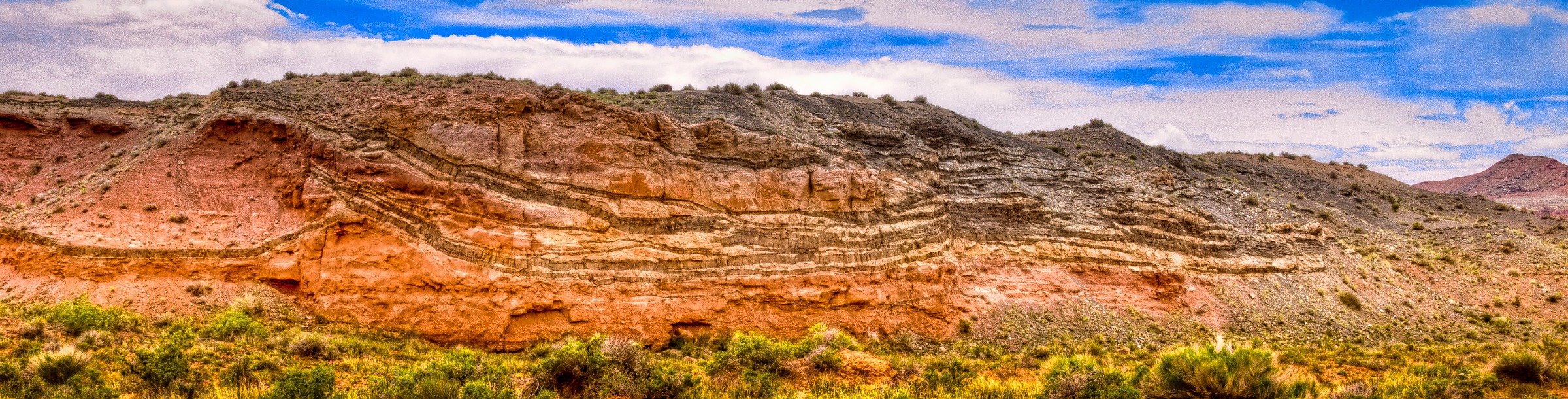 Numerous intrusions of lava between layers of sandstone in the Catheral Valley section of Capitol Reef National Park.