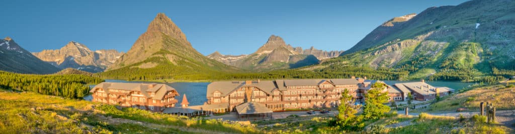 This dawn panorama captures the brilliant light on Many Glacier Hotel in Glacier National Park, Montana.