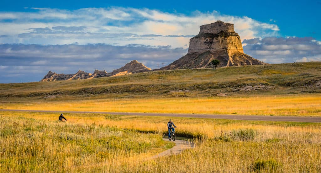 Two bicyclists enjoy the bike trails in Scotts Bluff National Monument in Nebraska.