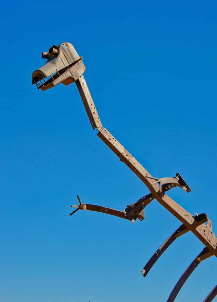 This dinosaur sculpture, made from automobile parts, is located at Carhenge, a roadside attraction outside of Alliance, Nebraska,
