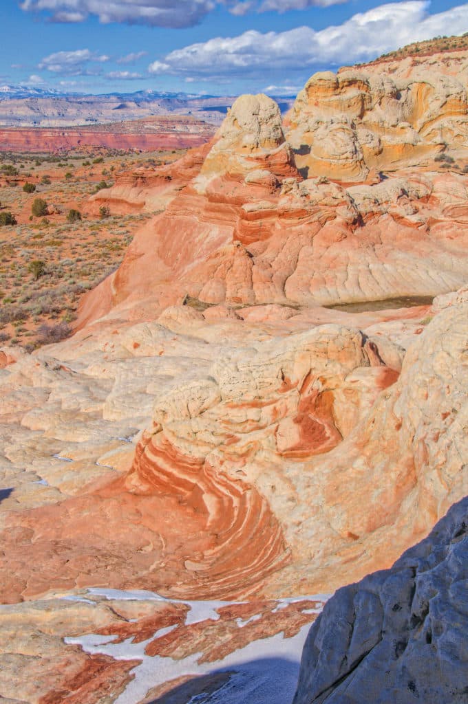 Brain rock butte and swirled sandstone at White Pocket in the South Coyote Buttes area of the Vermillion Cliffs National Monument