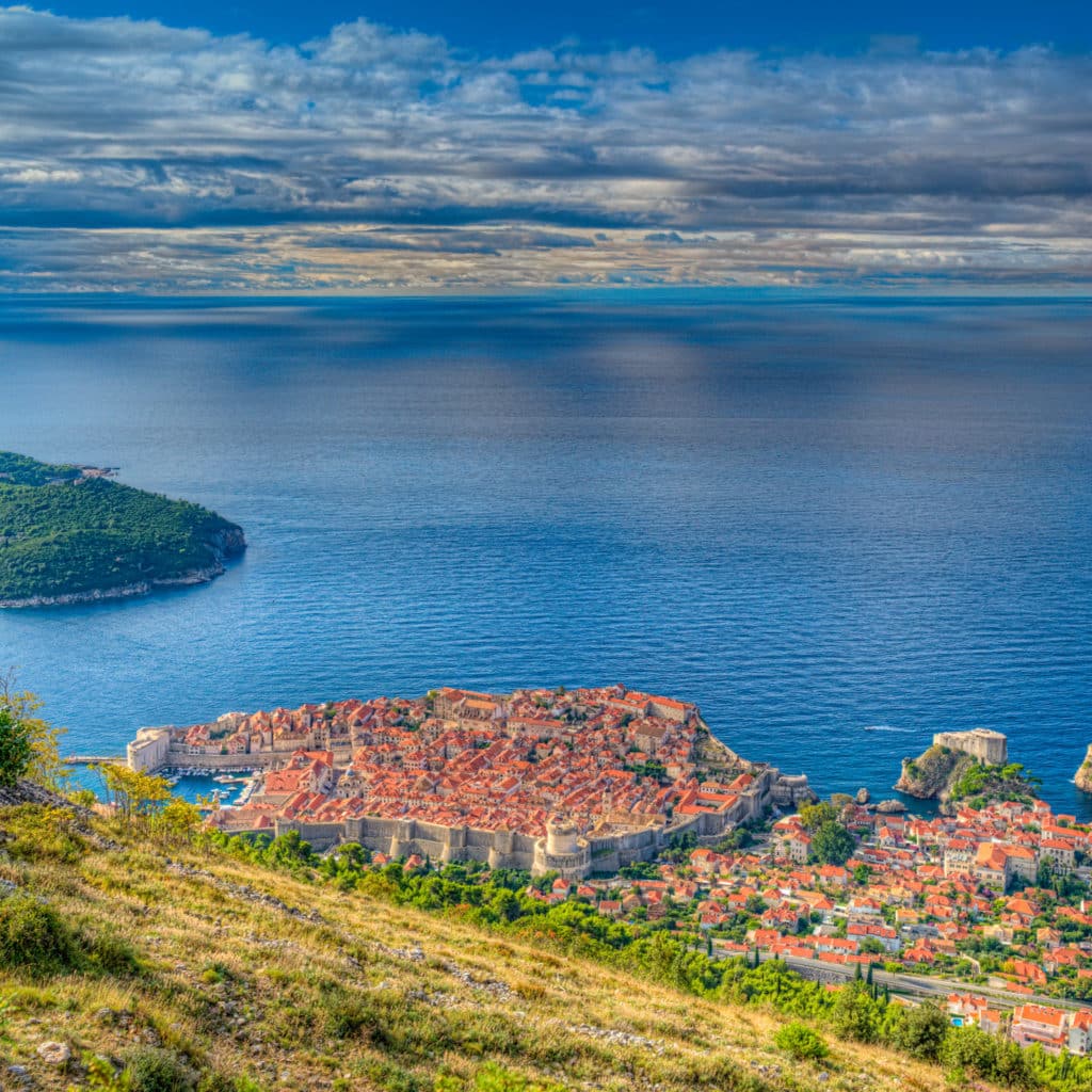 A view of Dubrovnik Old Town and its surrounding walls taken from Mount Srdj in Croatia.