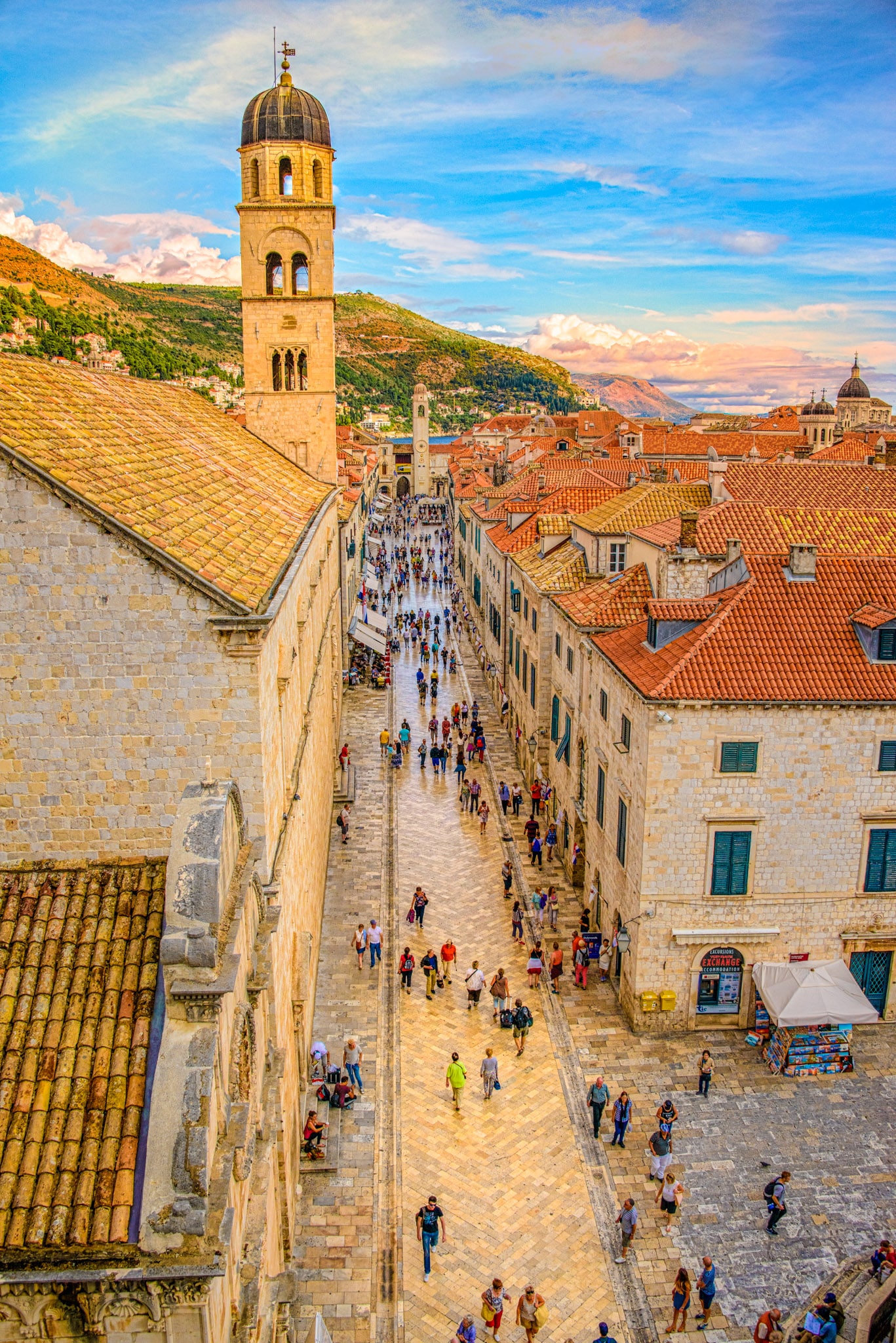 A view from Dubrovnik's city wall looking down the Stradum to the Dubrovnik Clock Tower in the distance and the Franciscan Church bell tower to the left.