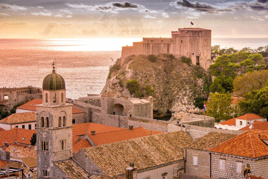 Lovrijenac Fortress and the bell tower of the Franciscan Monastery at sunset as viewed from the Dubrovnik Old Town wall.