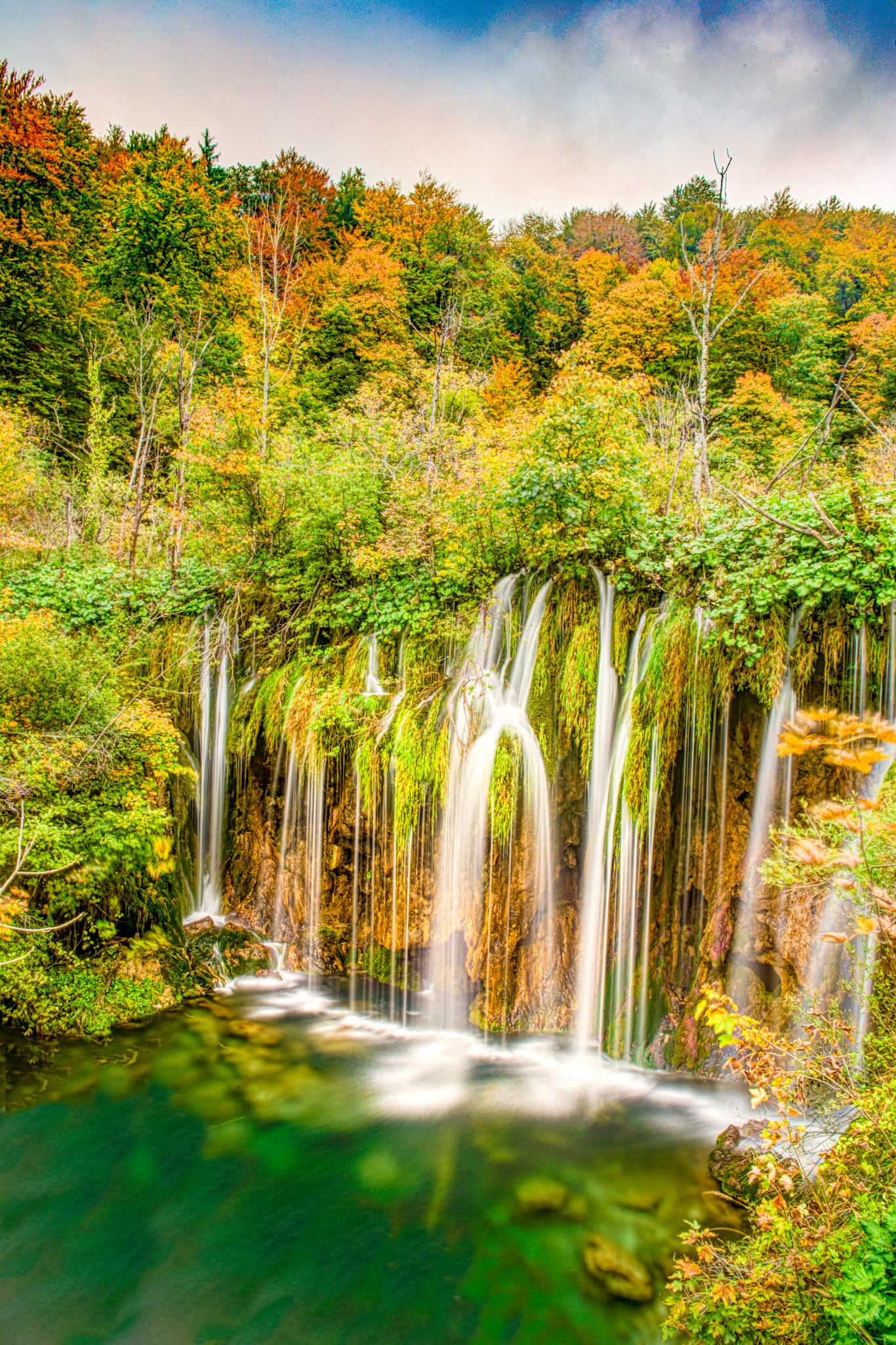 Waterfalls tumble into Lake Kozjak in Plitvice Lakes National Park in Croatia.