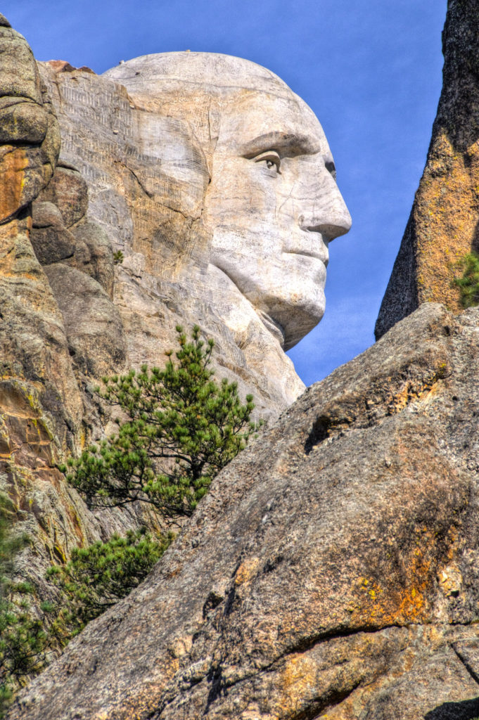A close-up of the profile of President George Washington carved into Mt. Rushmore.