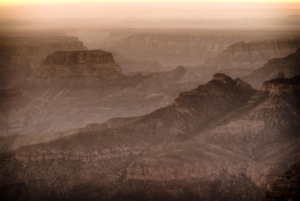 Woolsey Butte and Bourke Point at dawn as viewed from Point Imperial on the North Rim of the Grand Canyon. -  Grand Canyon North Rim