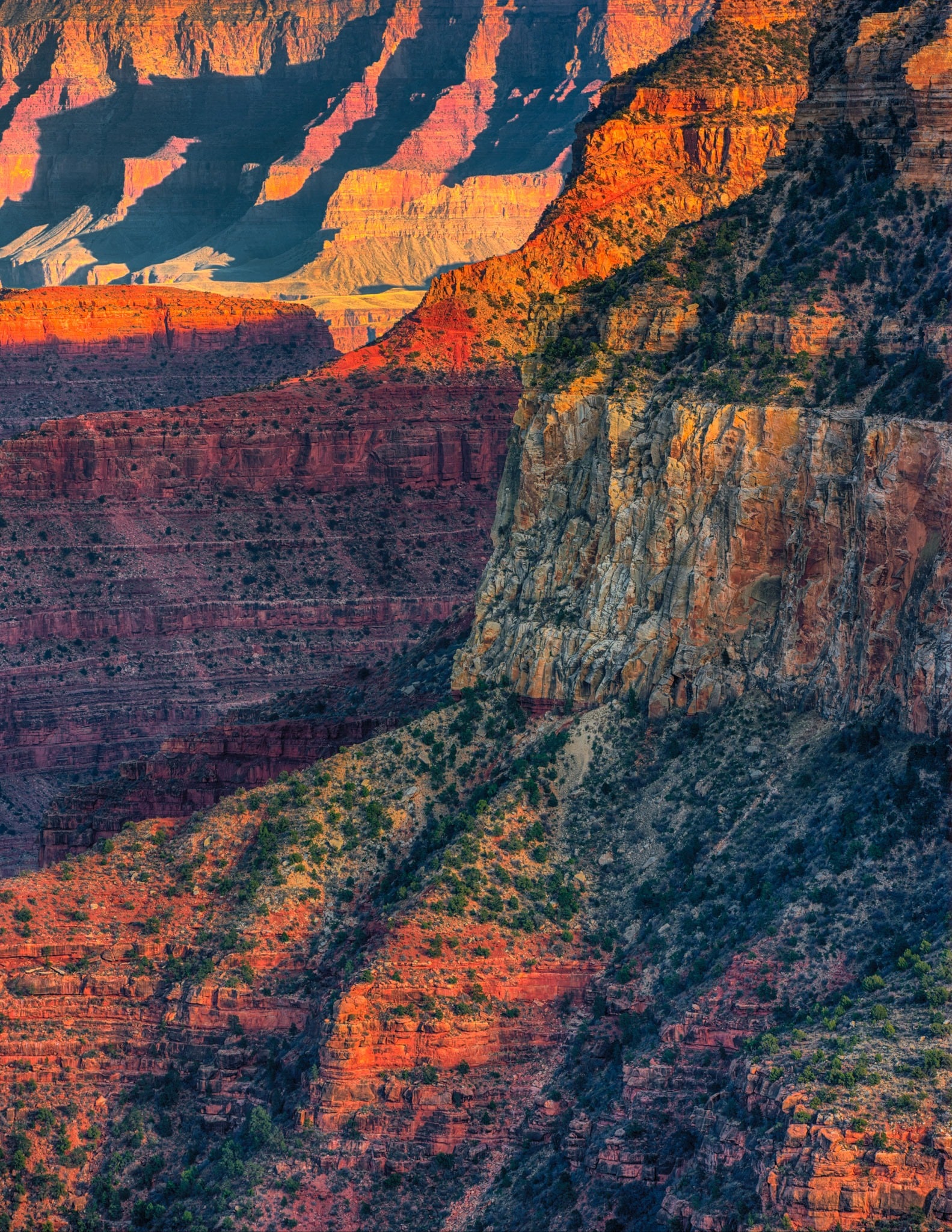 A view of the upper rock formations of the Grand Canyon as seen from the South Rim in Arizona.