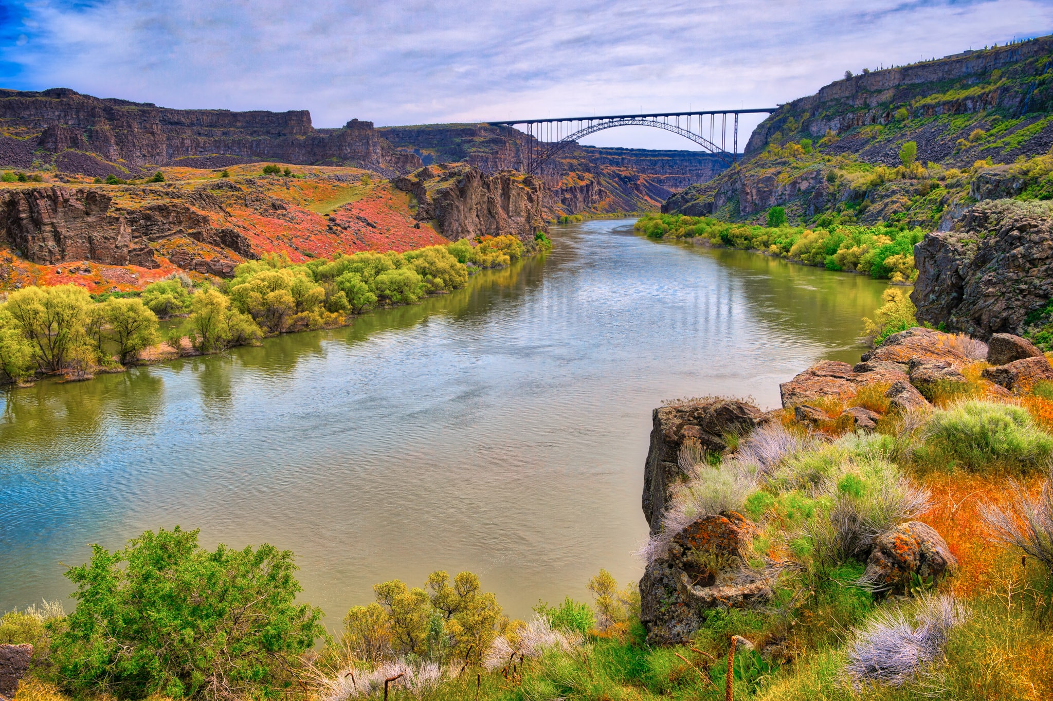 The Perrine Bridge is a truss arch bridge that spans the Snake River Canyon on US Highway 93 in Twin Falls, Idaho. The bridge is 1,500 feet long and has a pedestrian walkway.