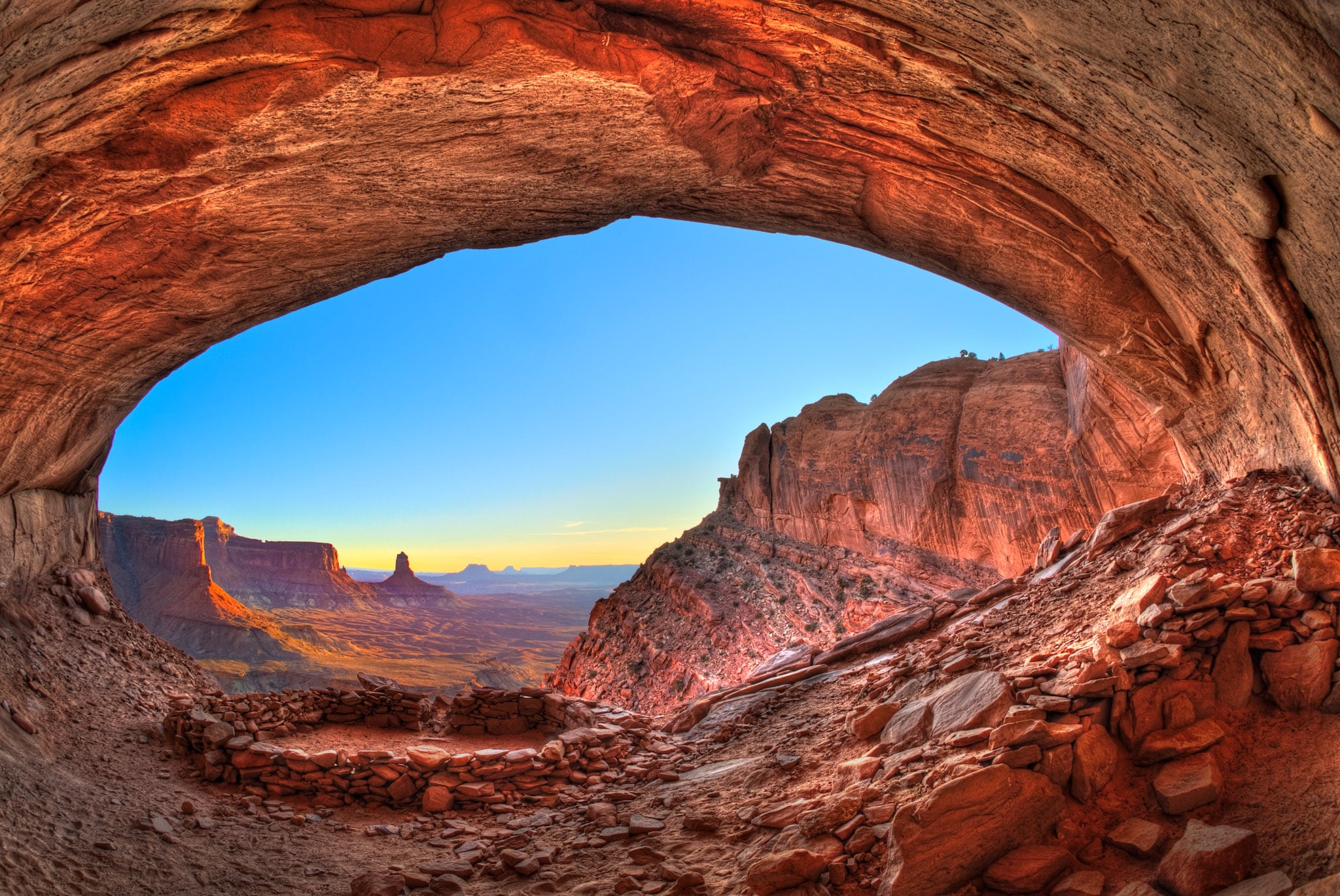 Looking south at sunset from the alcove of False Kiva in Canyonlands National Park, near Moab, Utah.