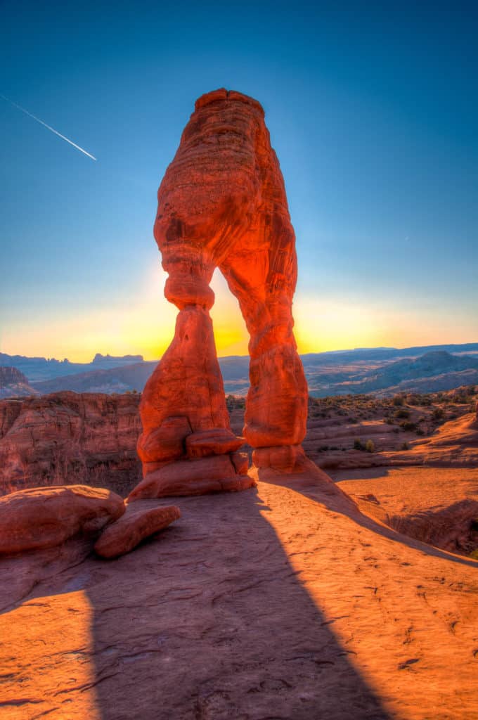 Delicate arch blocks the sun on a late afternoon in Arches National Park.