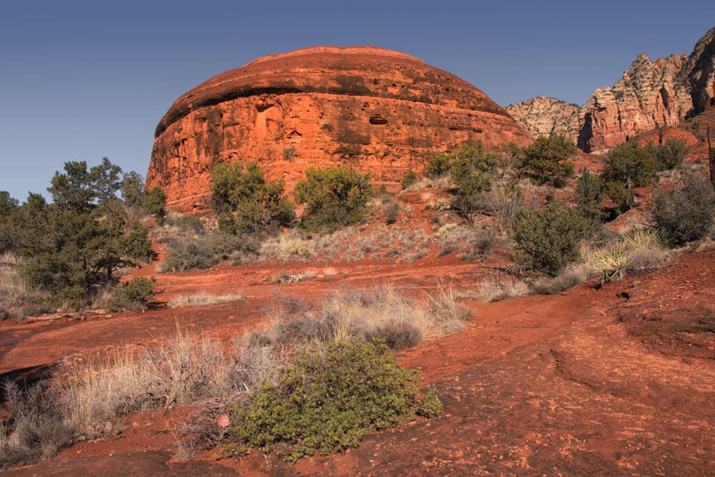 A dome-shaped rock formation seen on the Bell Rock Trail in Sedona, Arizona.