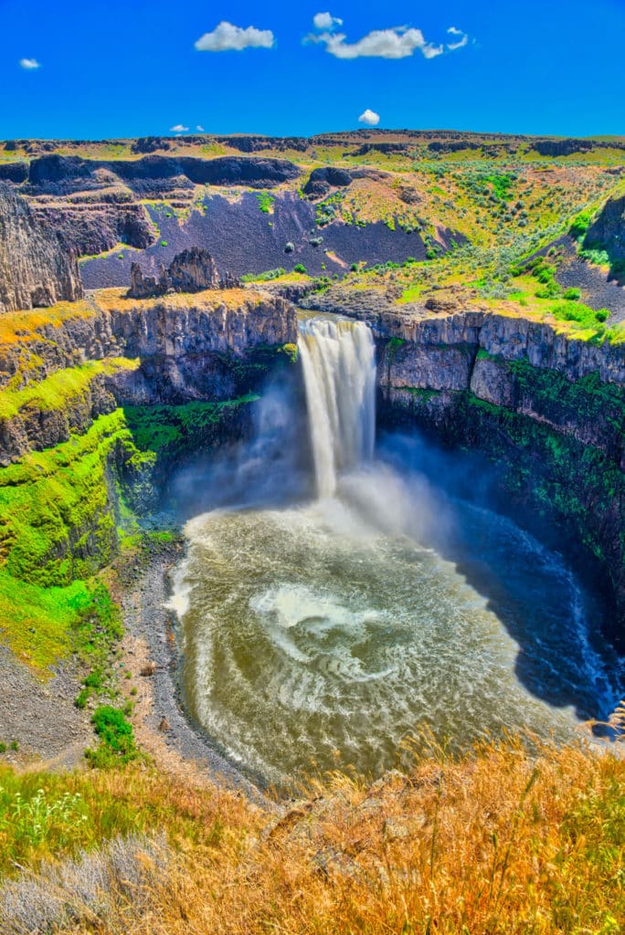 Palouse Falls, in Palouse Falls State Park, plunges 186 feet into a large plunge pool. It is one of several falls and cascades on the Palouse River. It is located between Spokane and Walla Walla, Washington.
