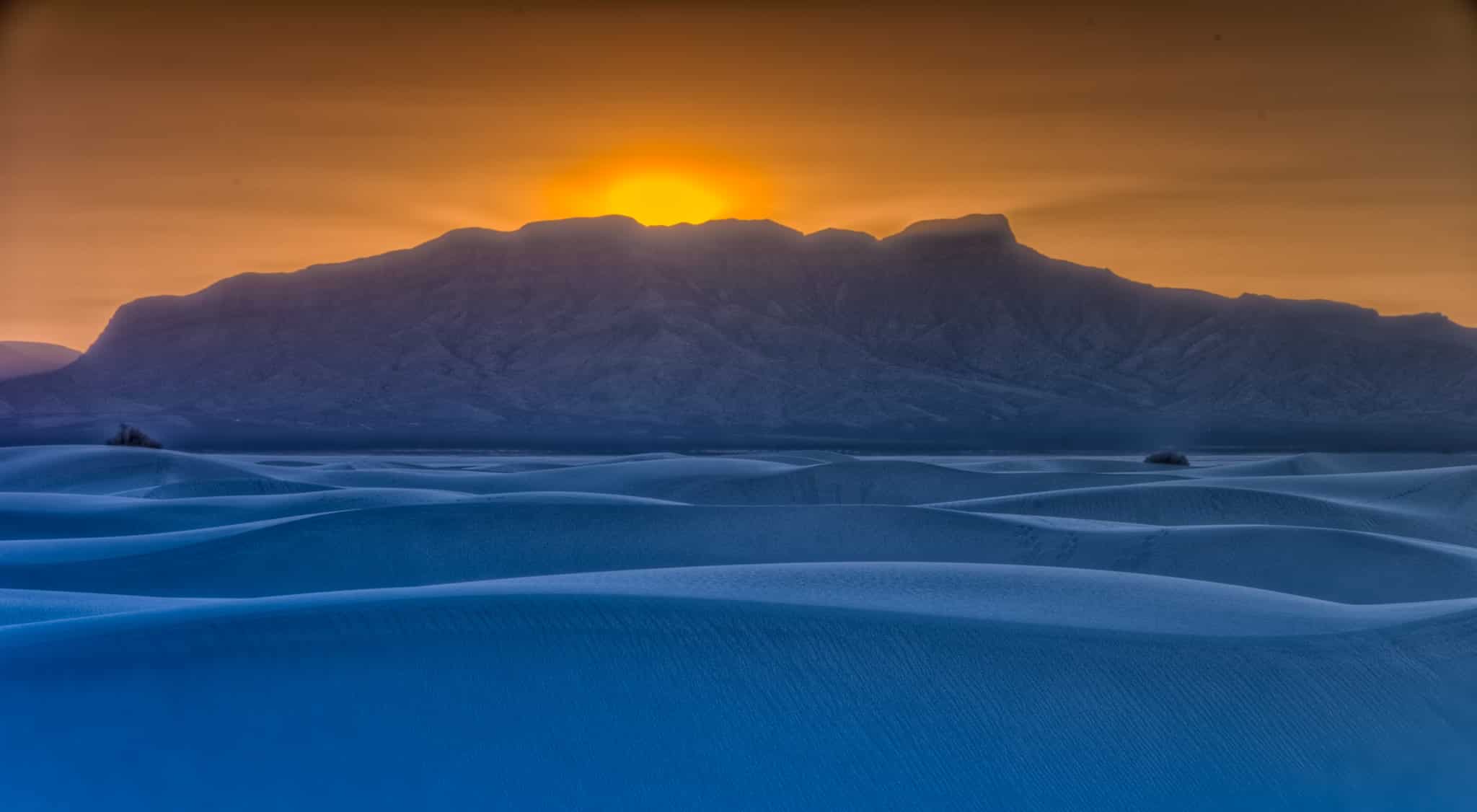 Looking west over White Sands National Monument toward the San Andres Mountains at sunset.
