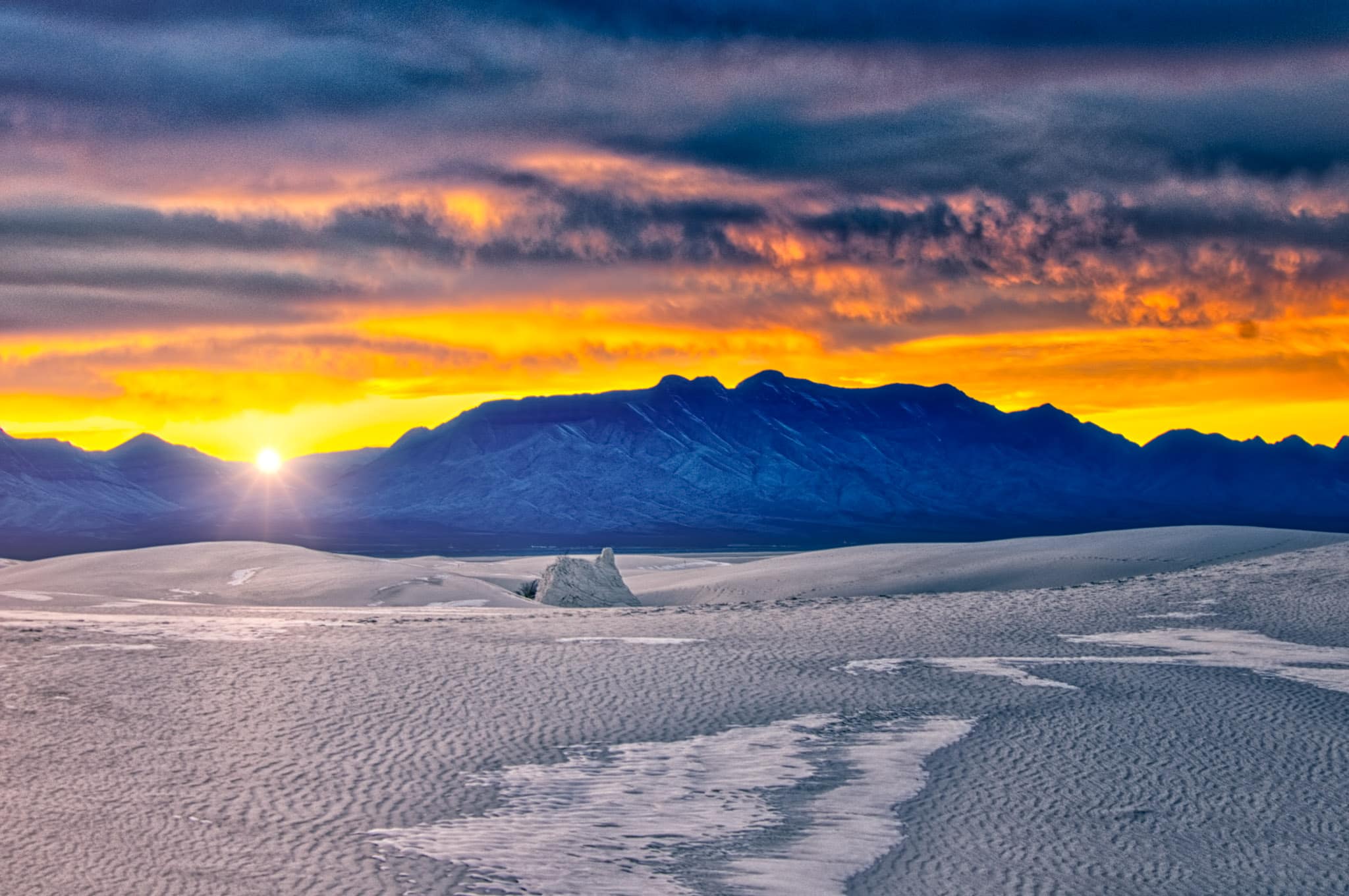 The setting sun accentuates the ripples in the gypsum sand of White Sands National Monument in New Mexico.