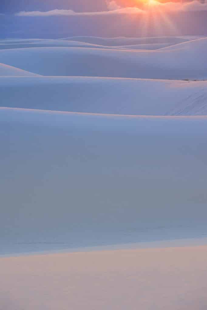 Late afternoon sun tints White Sands National Monument in pastel colors.