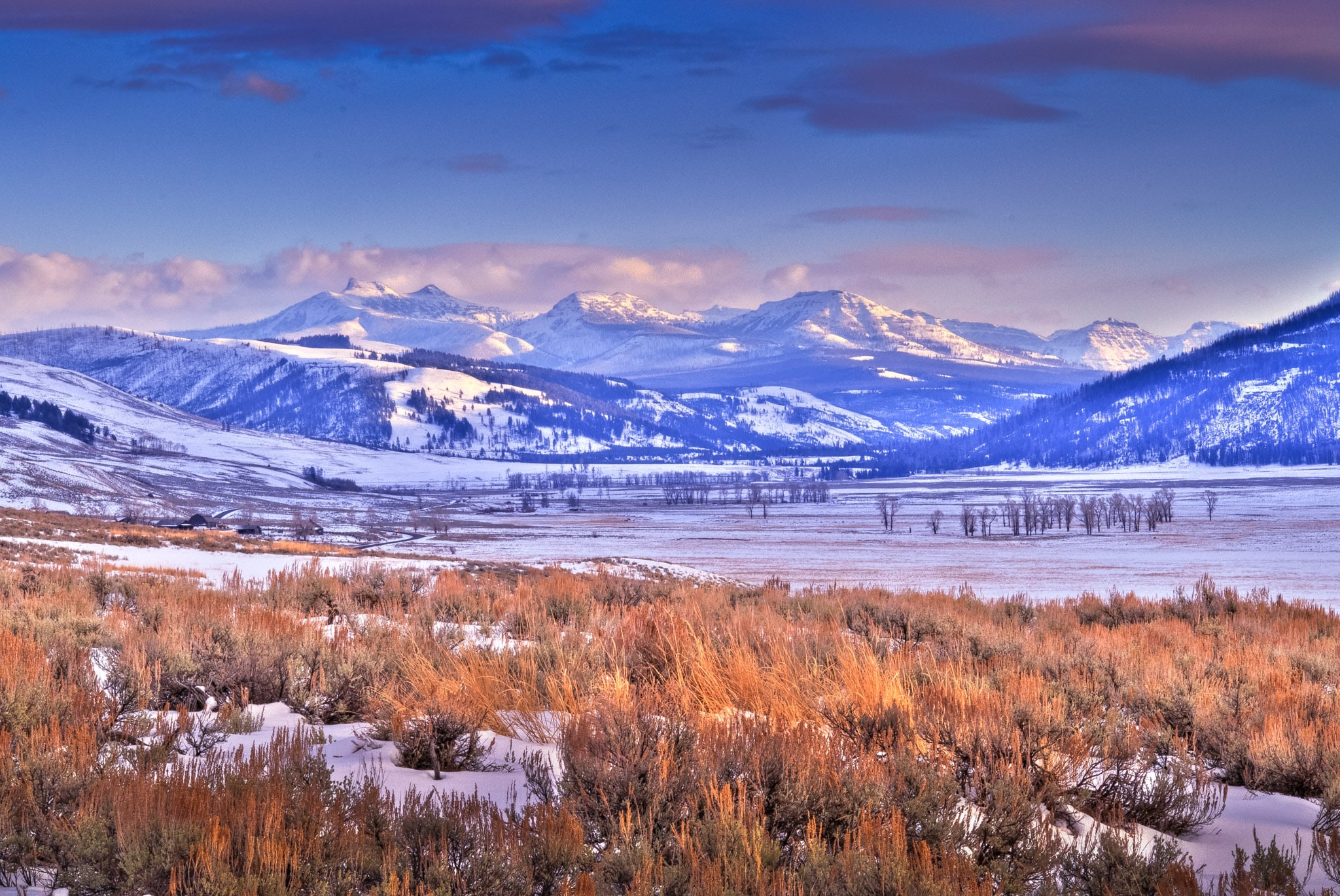 Looking northwest up the Lamar Valley in Yellowstone National Park about a half hour before the sun went behind the mountains to the southeast. The mountain in the distance is Saddleback Mountain.