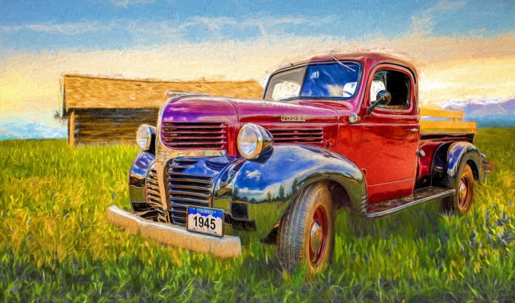 Painting of a 1945 Dodge Pickup Truck with red body and black fenders, in a field with a log cabin in the distance.