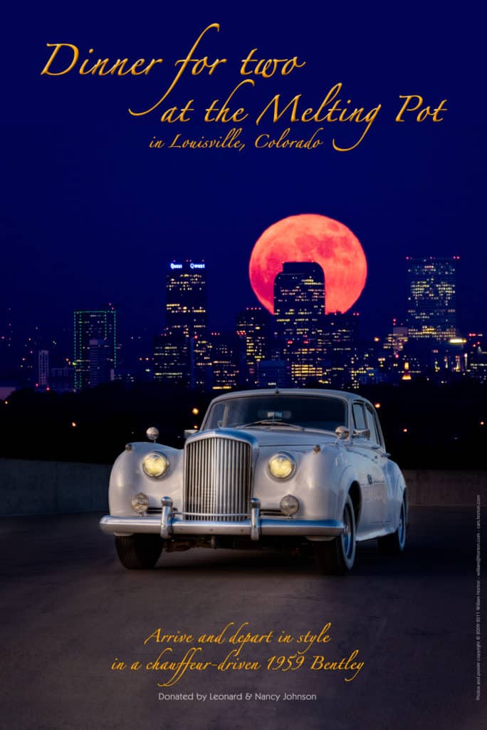 Photo poster of a 1959 Bentley S1 taken at night with a red moon and cityscape in the distance.