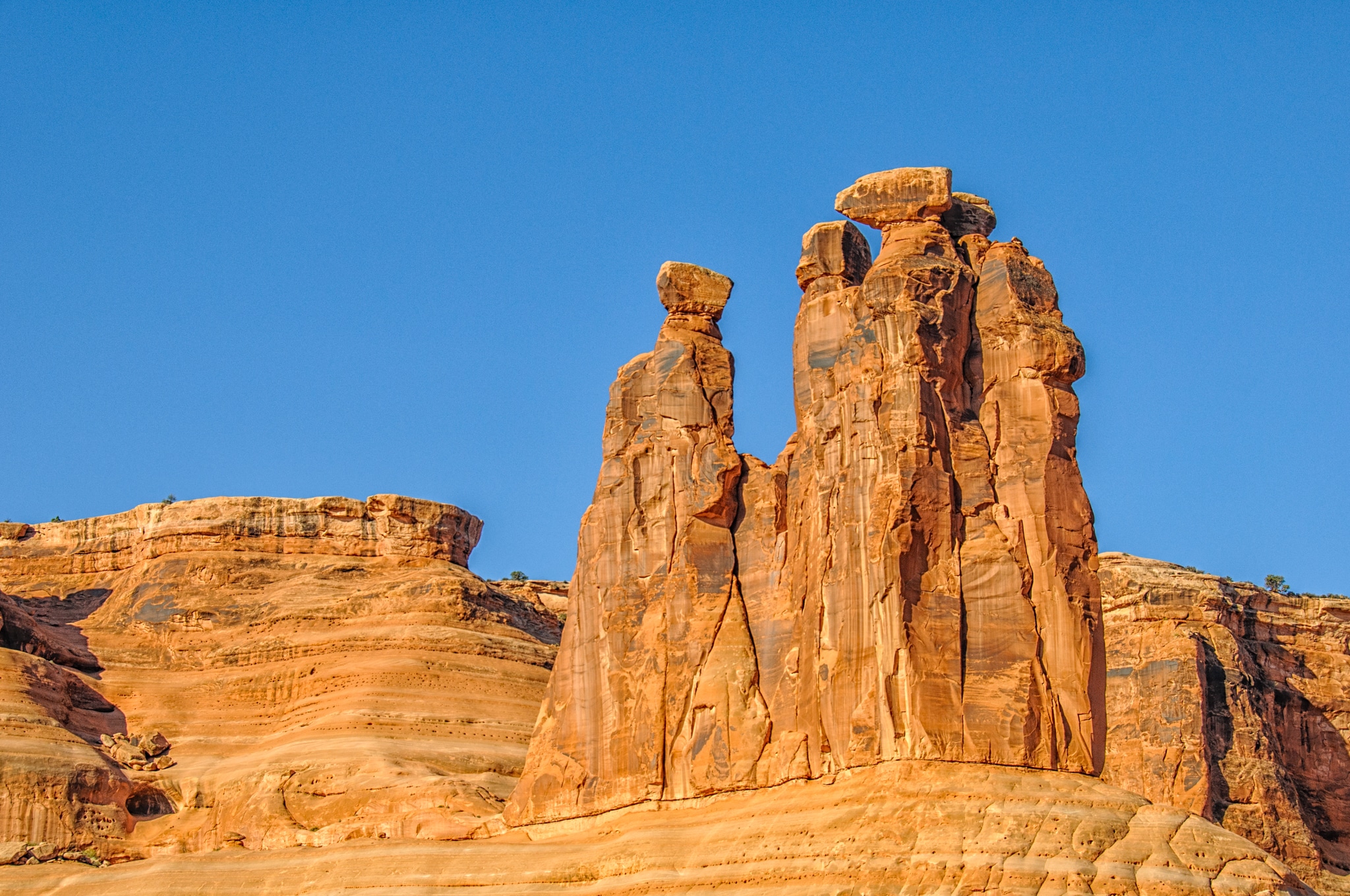 Rock formation known as The Gossips. (Imagine pioneer women wearing 1800s attire.) In Arches National Park.