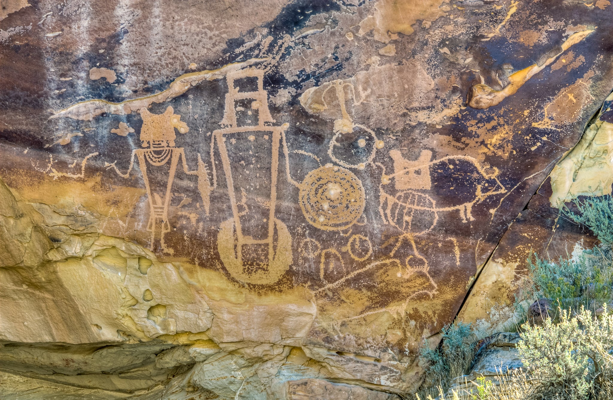 Petroglyphs in "Swelter Shelter" are thought to be from the Fremont Culture. Swelter Shelter is located along Cub Creek Road in Dinosaur National Monument near Vernal Utah.