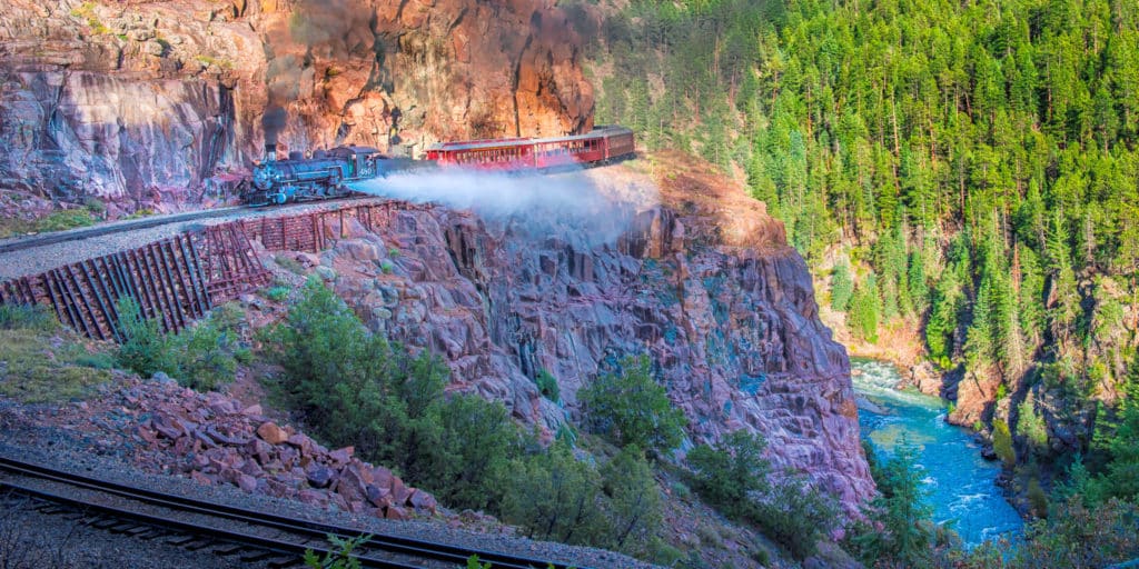View of the autumn Durqango & Silverton Photography train as it makes its way along the Animas River between Durango and Silverton, Colorado.