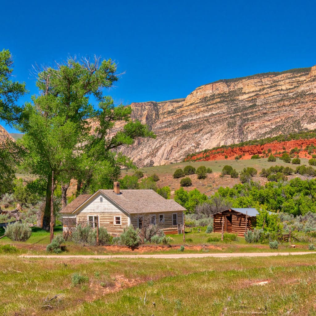 The old Chew Ranch lies on both sides of Echo Park Road in Dinosaur National Monument, Colorado. The surrounding cliffs provided protection and water to pioneer settlers in the late 1800s and early 1900s.