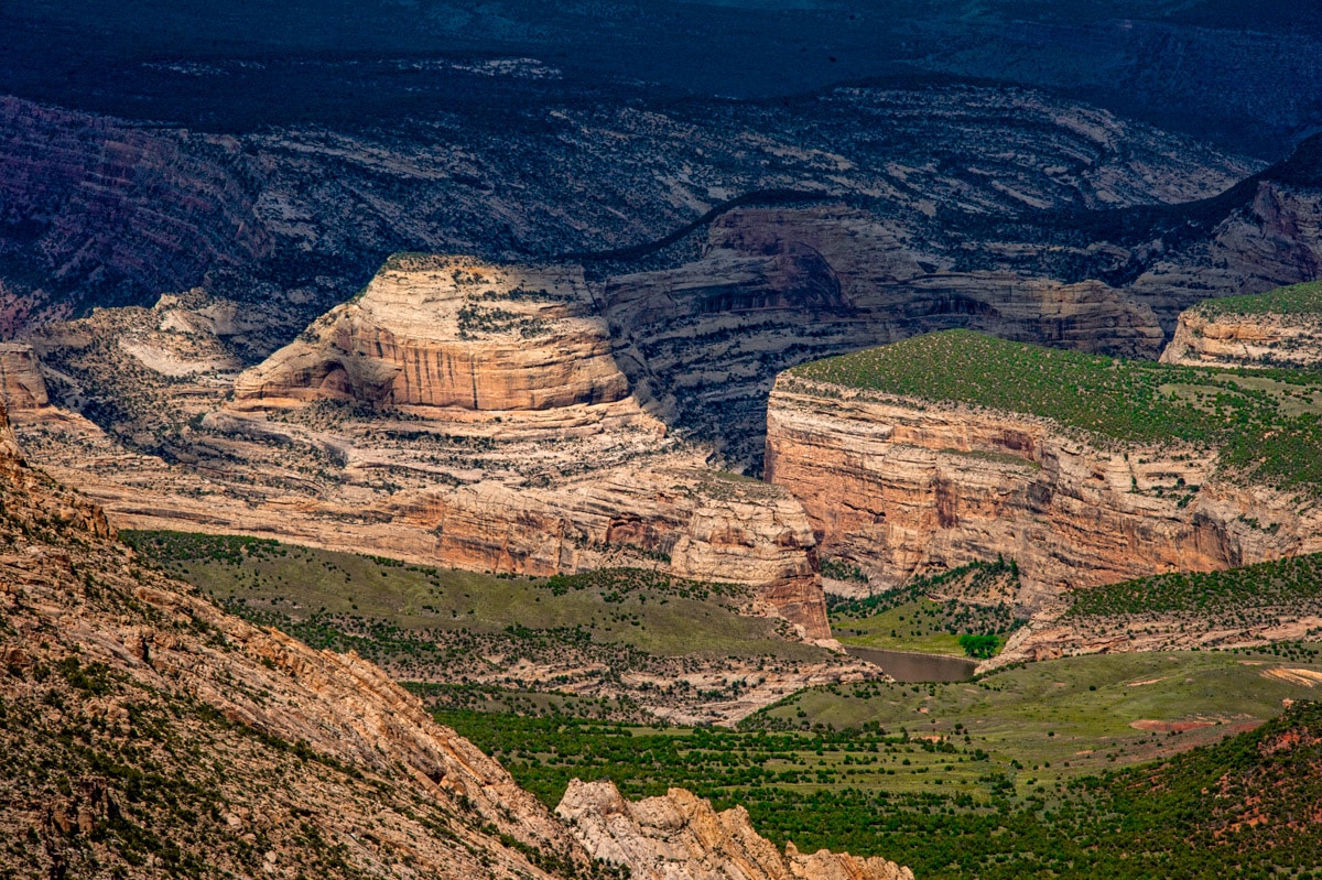 Taken from the Canyon Overlook, along Harpers Corner Road, you can see iconic Steamboat Rock near the confluence of the Green and Yampa Rivers in Dinosaur National Monument, Colorado.