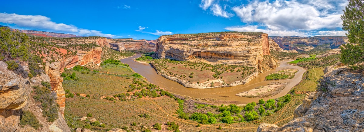 This panorama, taken from a viewpoint at Castle Park Overlook, shows a bend of the Yampa River around the Crows Nest.