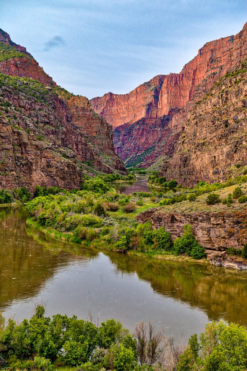 The placid Green River enters the imposing canyon, known as the Gates of Lodore, beginning its tumultuous journey through the canyon where it will join the Yampa River at Echo Park in Dinosaur National Monument, Colorado.