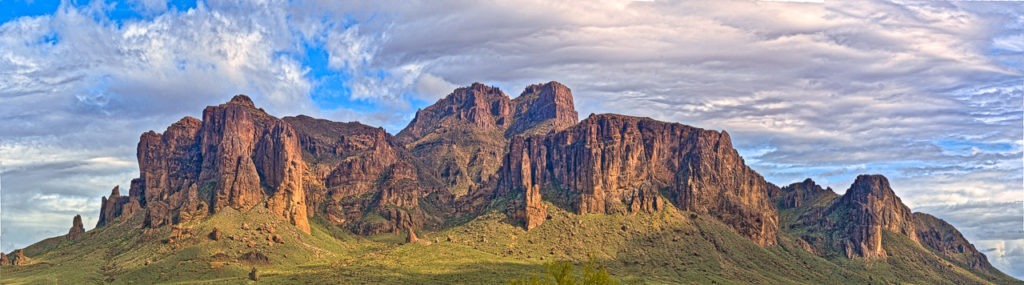 Break in a rainstorm over Superstition Mountain, east of Apache Junction, Arizona.