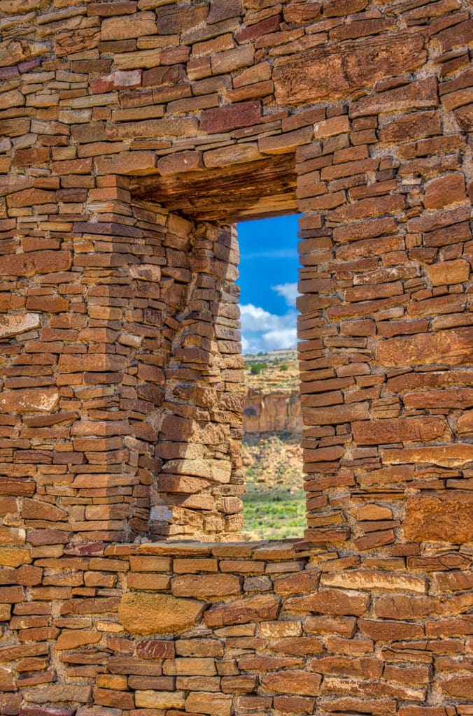 Windows provide a view to the west from Pueblo del Arroyo in Chaco Canyon, New Mexico. Wood beams provide support to the tops of windows and were brough to Chaco Canyon from as fara away as 75 miles.
