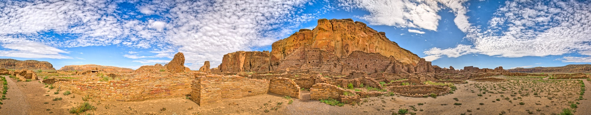 This panorama shows the entire Pueblo Bonito great house site. Pueblo Bonito was the largest of the Chacoan great houses with over 700 rooms, 32 kivas, and 3 great kivas. Pueblo Bonito is located in Chaco Canyon, New Mexico.