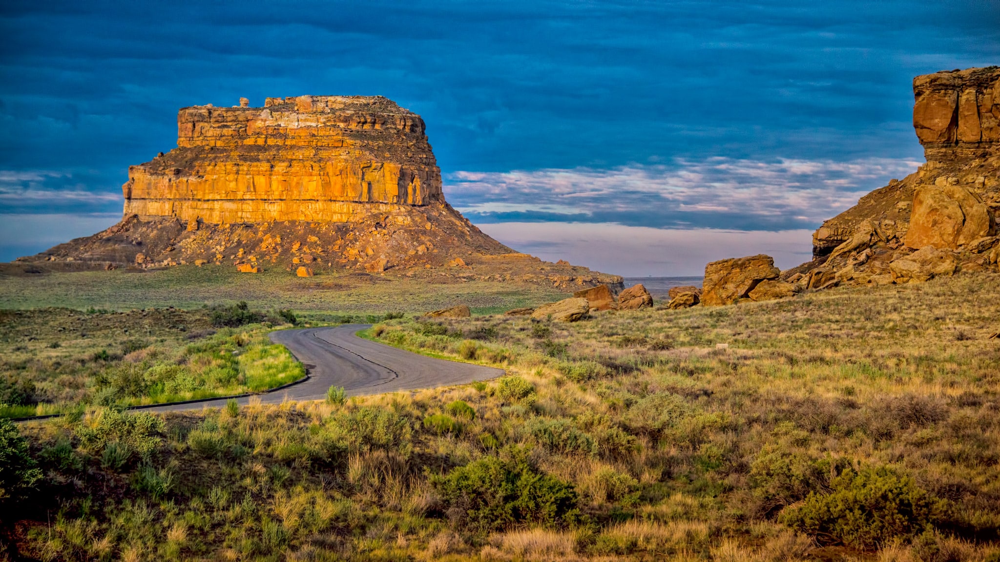 Angry clouds of evening thunderstormshang menacingly above Fajada Butte In Chaco Culture National Historical Park in Chaco Wash, New Mexico.