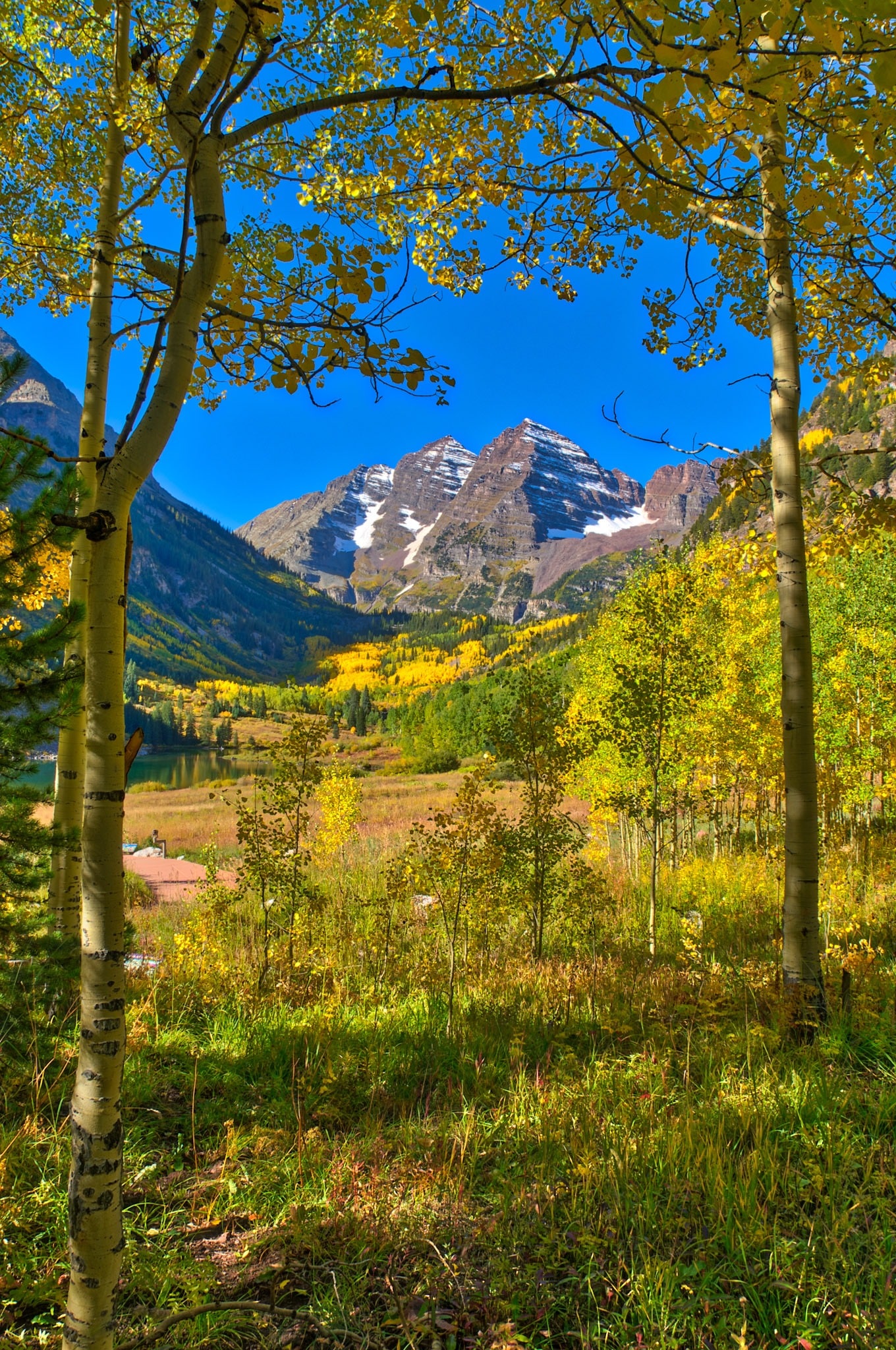 A view of the Maroon Bells in the crisp morning light in the Maroon Bells Recreation Area near Aspen, Colorado.
