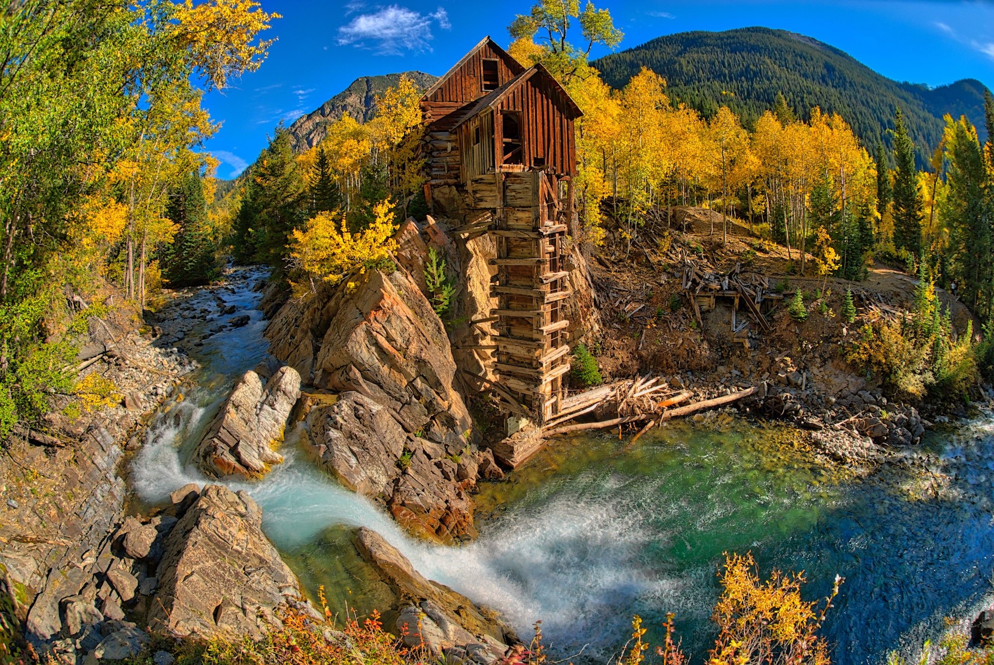 A wide-angle view of the old Crystal Powerhouse along the Crystal River near Marble, Colorado.