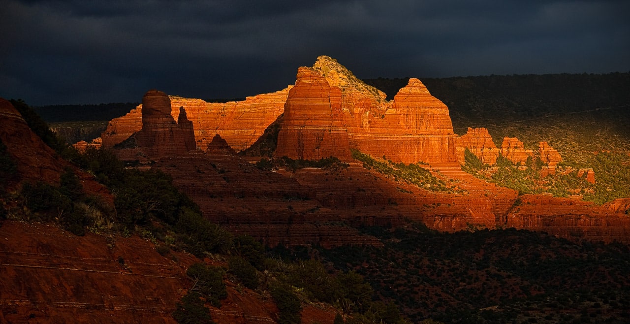 Thumb Butte (in shadow) and the Bench just before sunset in Sedona, Arizona.