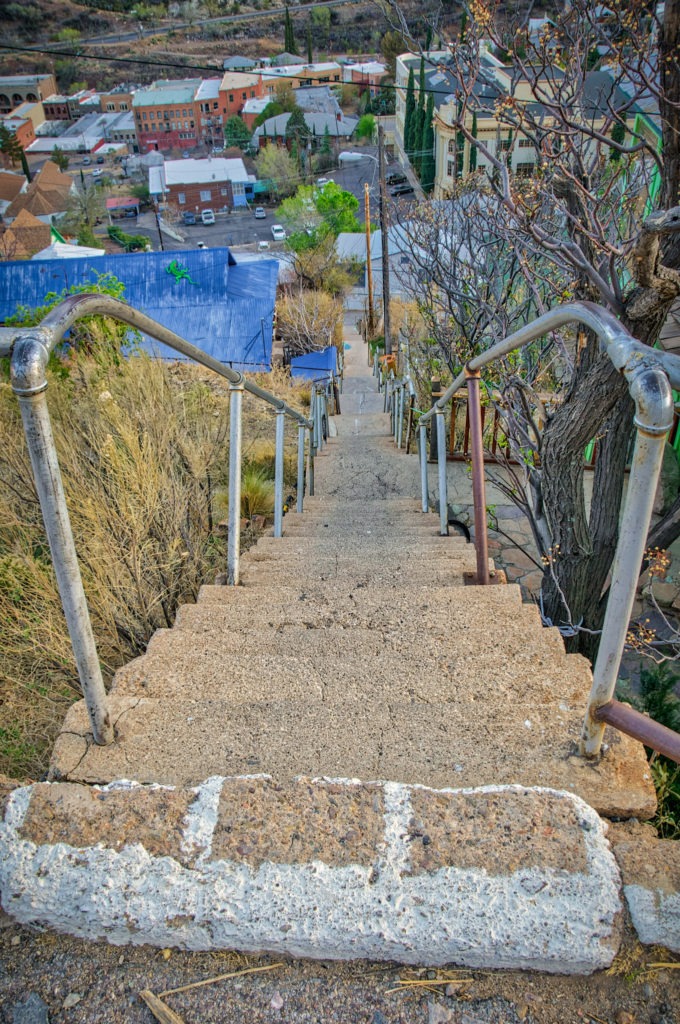 A view looking down one of many staircases that connect upper and lower streets in Bisbee, Arizona.
