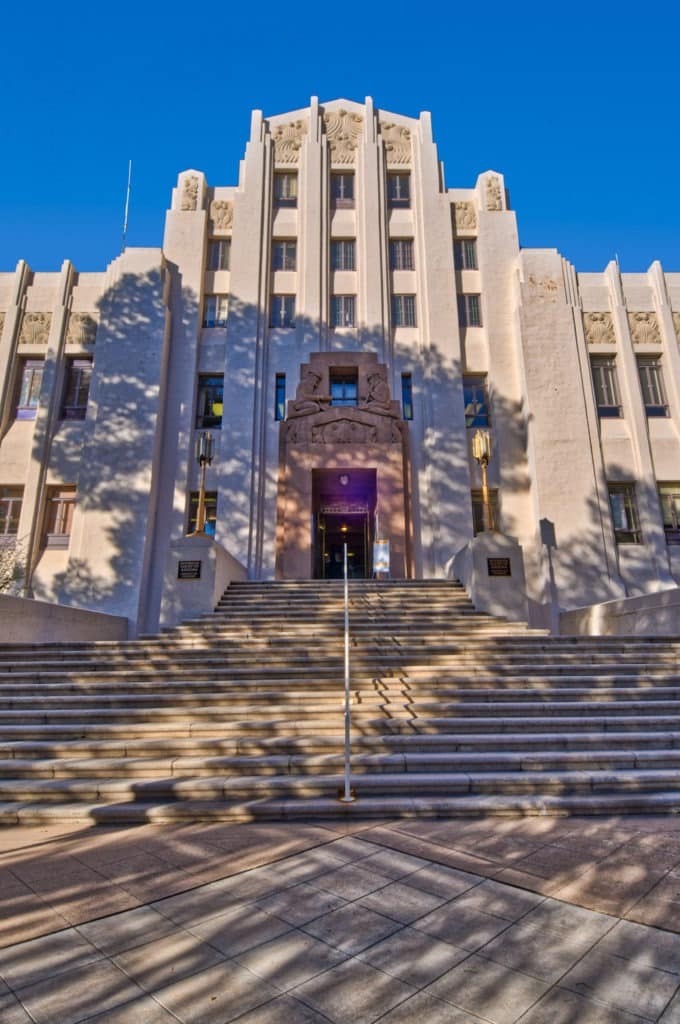 This view of the Cochise County Courthouse in Bisbee, Arizona, features the grand staircase leading up to the Art Deco building designed by Tucson architect Roy Place.