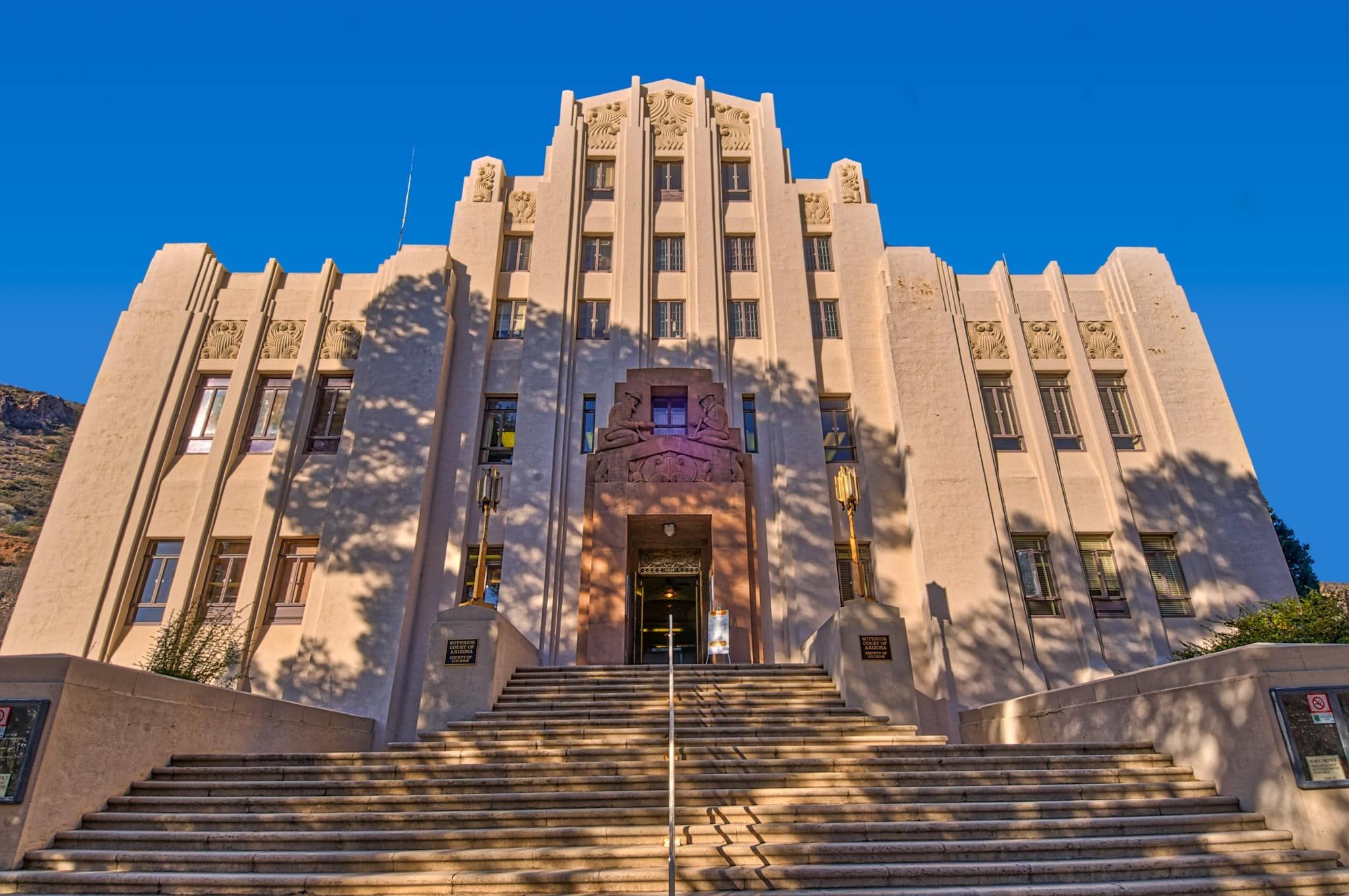 This view of the Cochise County Courthouse in Bisbee, Arizona, features the grand staircase leading up to the Art Deco entrance to this public building designed by Tucson architect Roy Place.