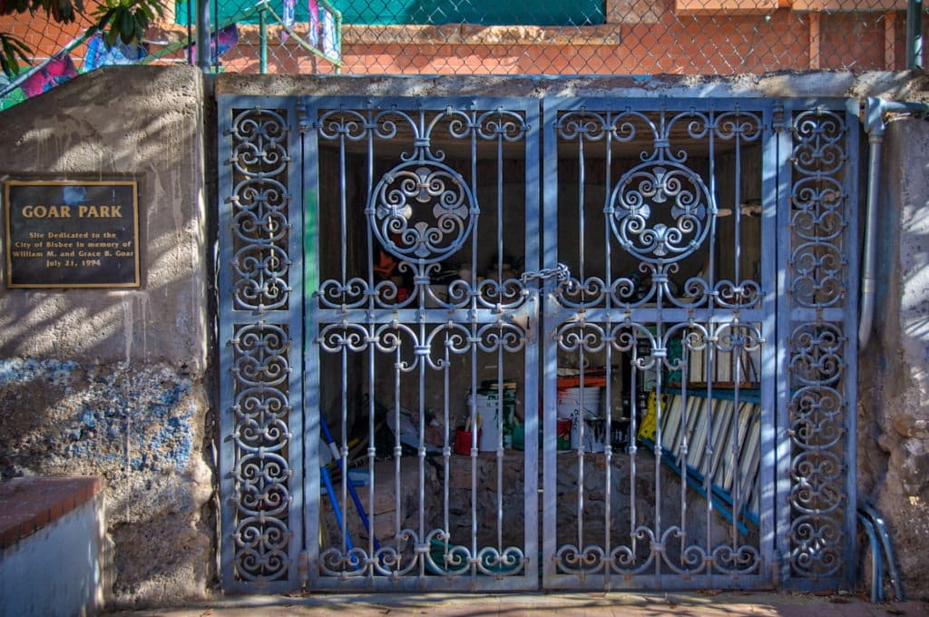 These highly ornamental iron gates protect the not so grand entrance to a cellar off of Goar Park in Bisbee, Arizona.