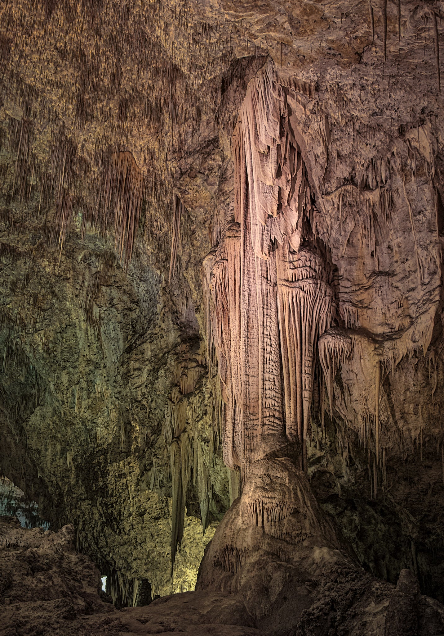 Draperies create the illusion of a wraith in the Big Room area of Carlsbad Caverns National Park, New Mexico.